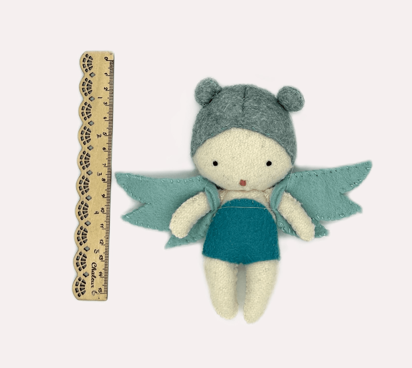 Felt Tooth Fairy with ruler for scale, front side